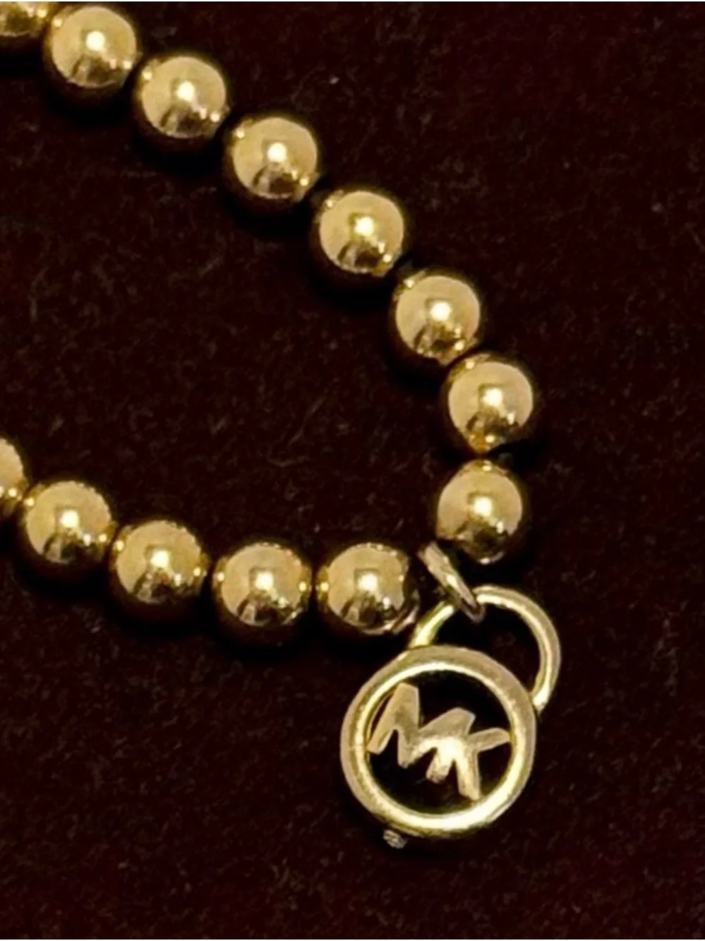 Michael Kors NWT and Dust Bag Gold-Tone Beaded Brown Suede Logo Charm Bracelet